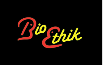 Leuchtender Schriftzug Bioethik vor schwarzem Hintergrund